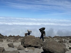 porters carrying bags at Kilimanjaro